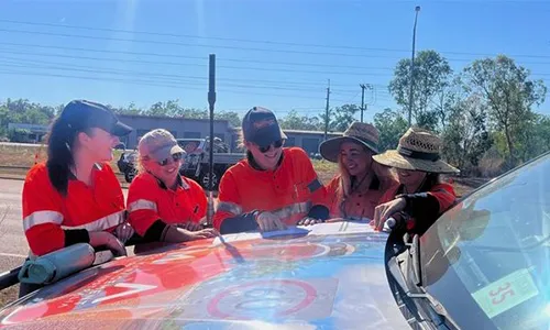 Lena pictured in the centre, collaborating with the Trafficwerx team